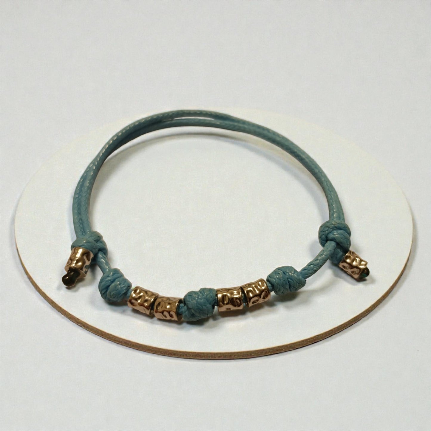 Bracciale cordino colorato e 4 granelli