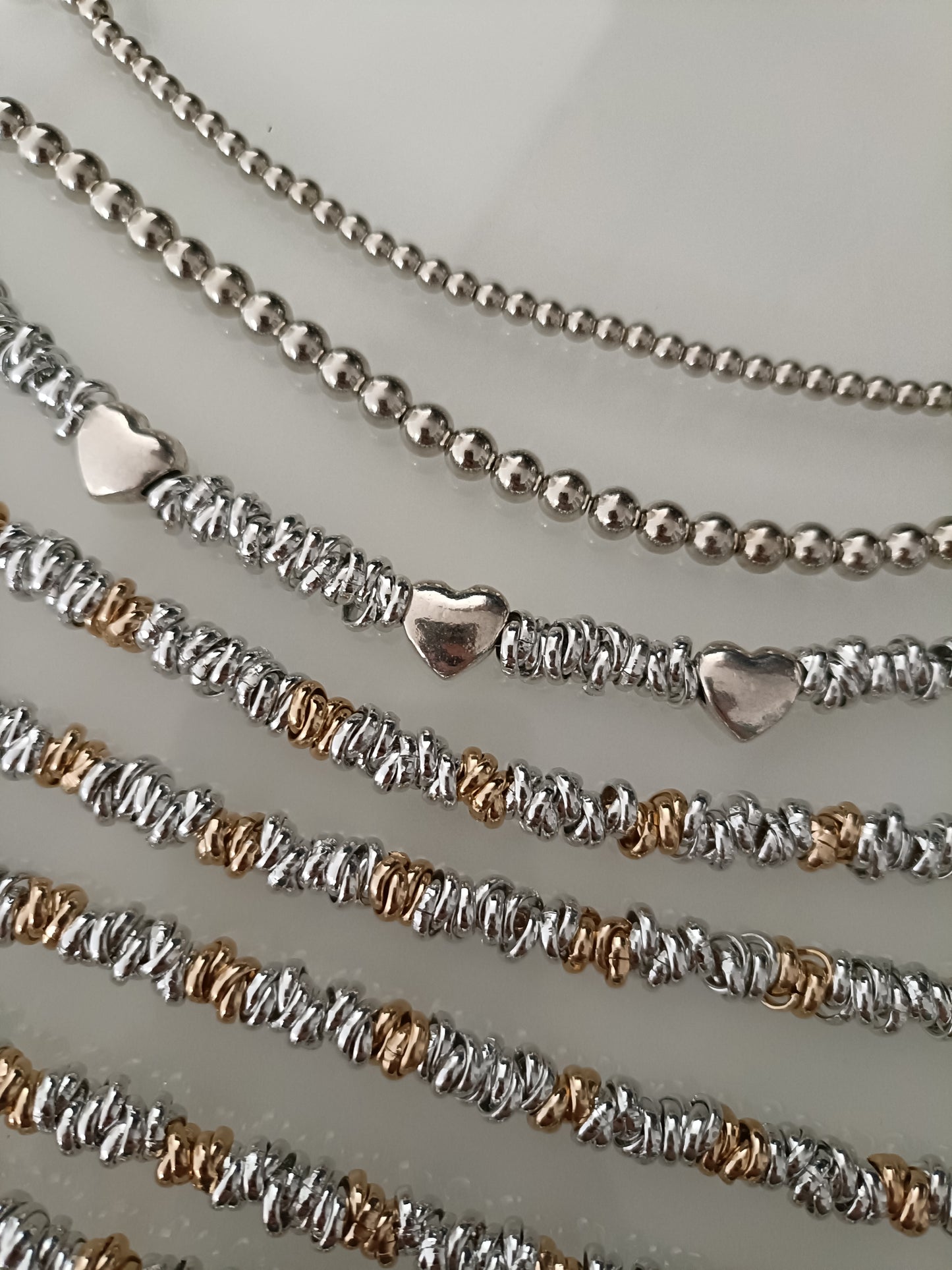 Bracciale tre cuori e sfere medie