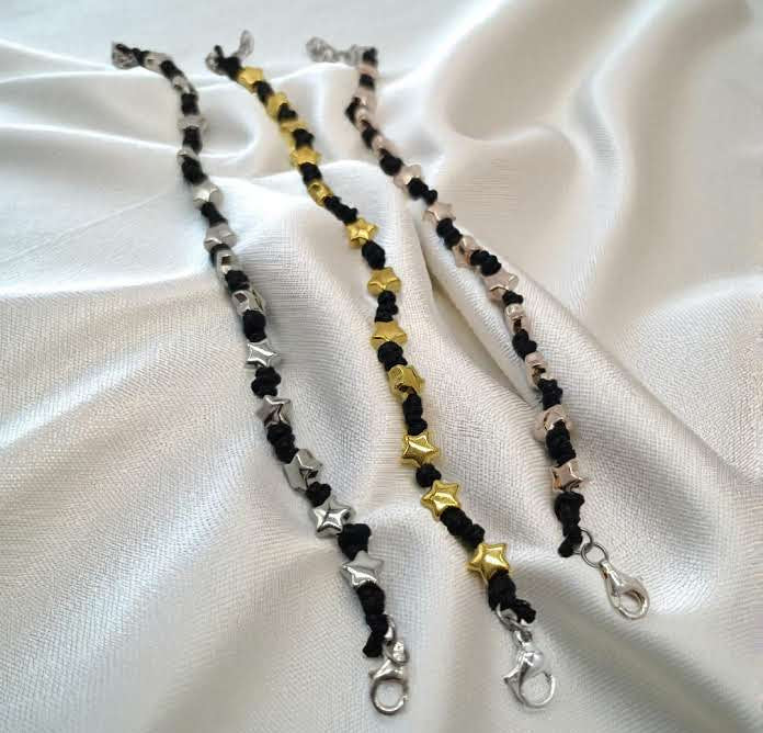 Bracciai cordino nero e stelle