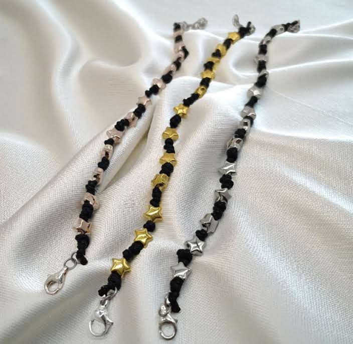 Bracciai cordino nero e stelle