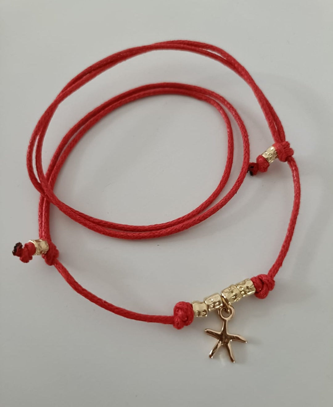 Collana cordino colorato e granelli