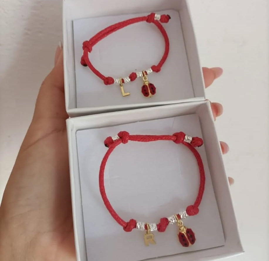 Bracciale cordini colorato con coccinella