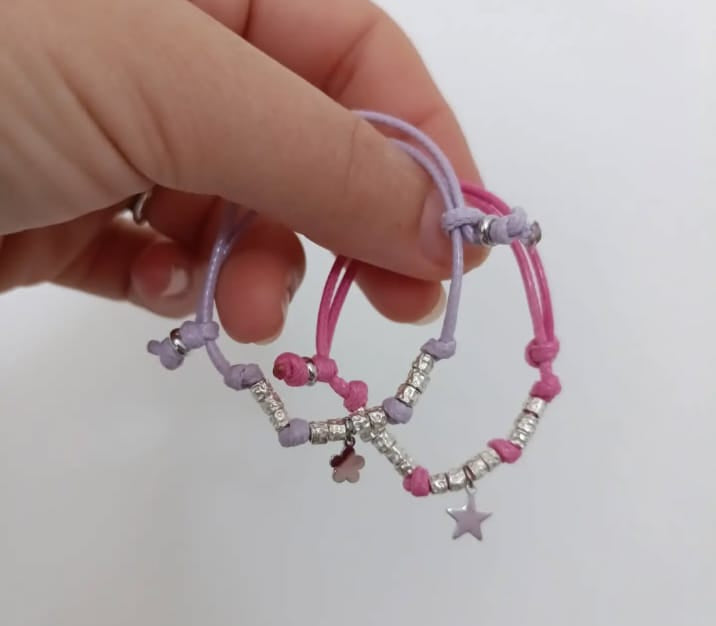 Bracciale cordino baby con stella e 10 granelli