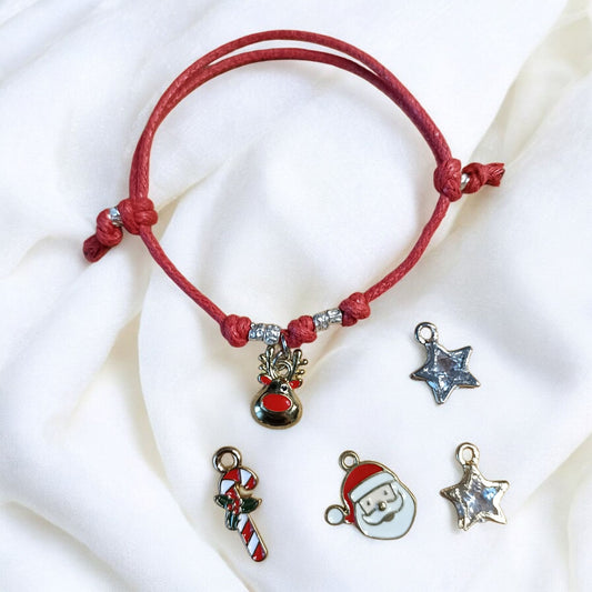 Bracciale baby cordino rosso e ciondolo
