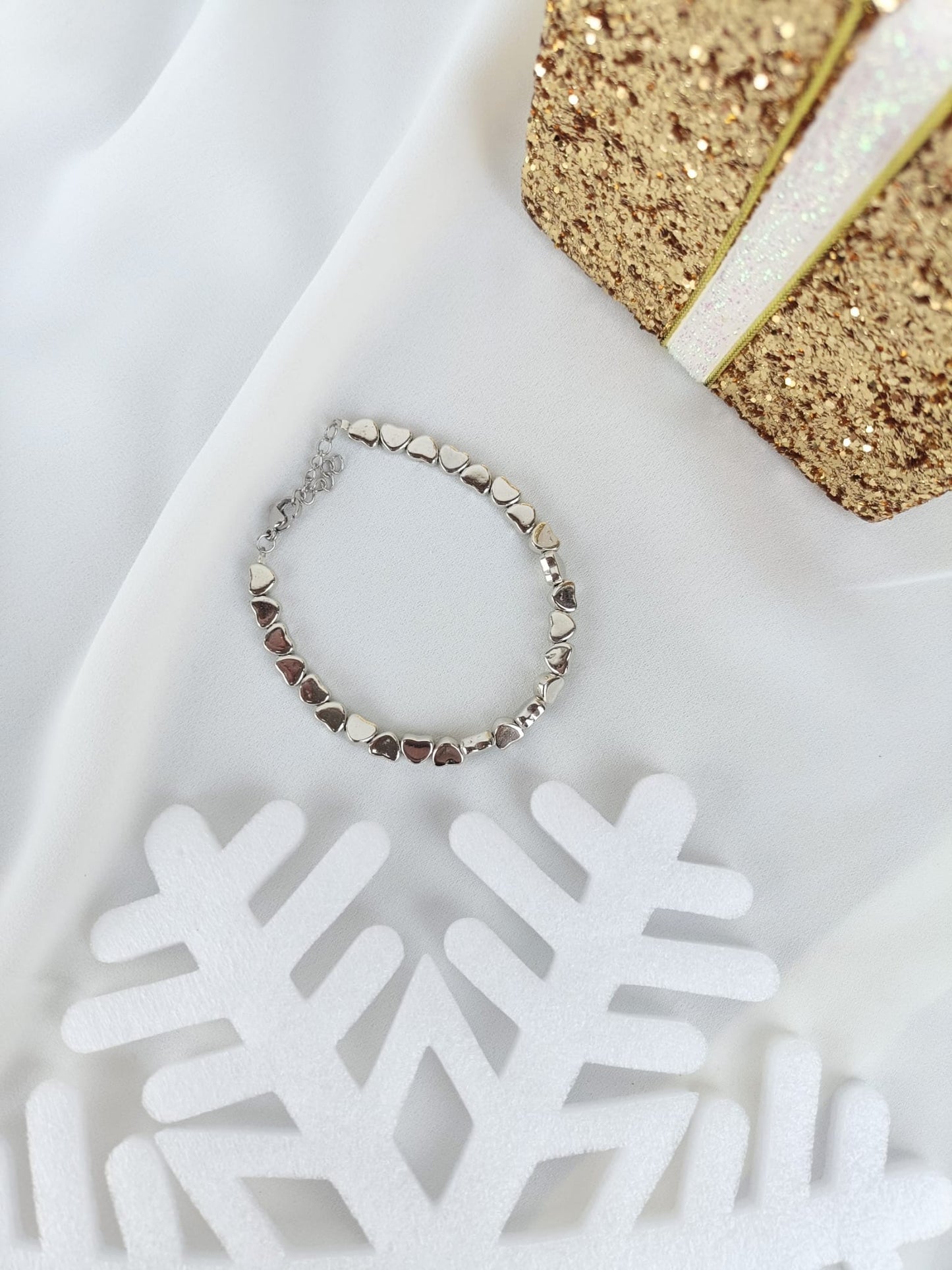 Bracciale cuori ematite argento e oro rosa