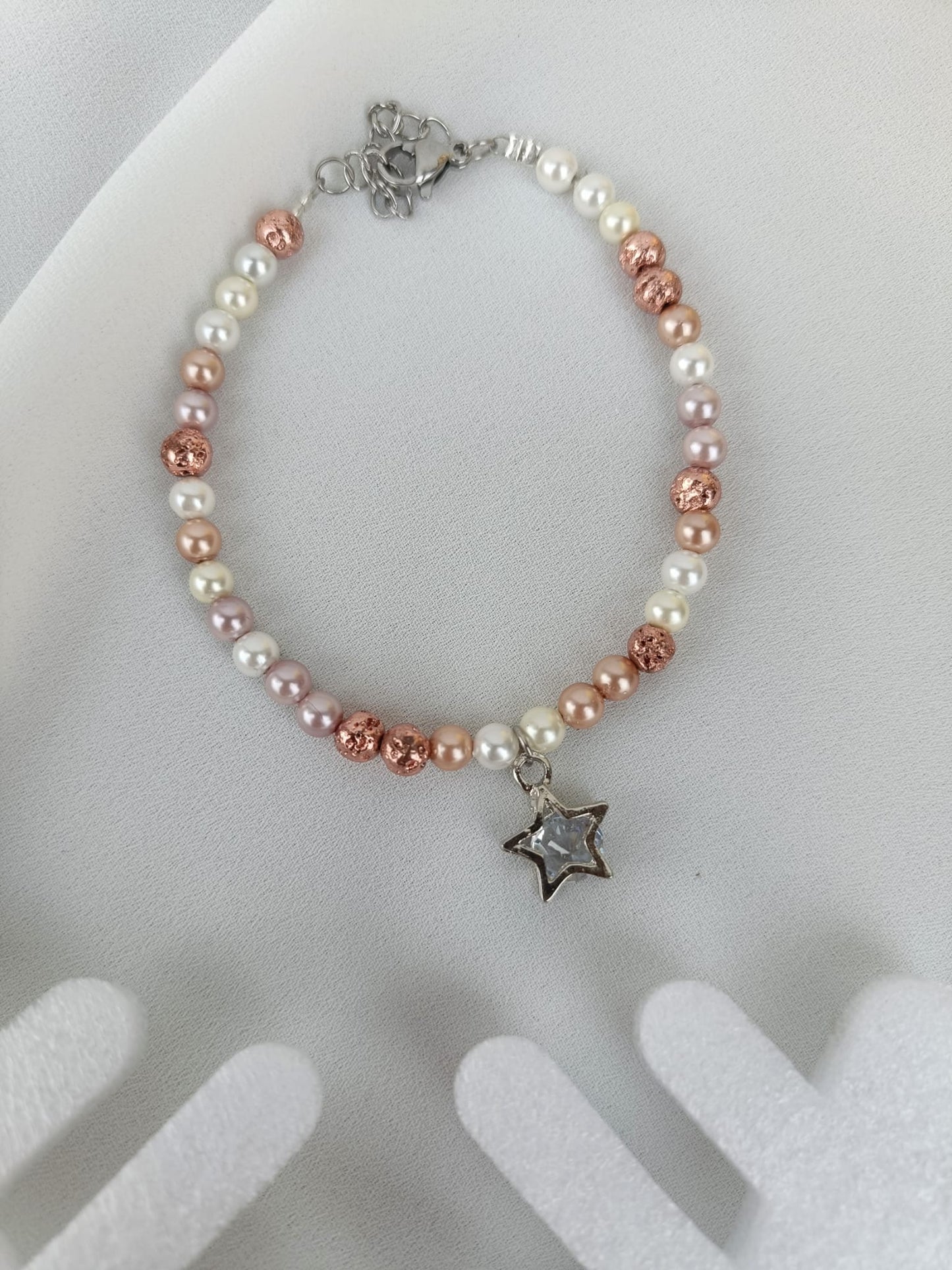 Bracciale perle di fiume chiare/rosate e stella