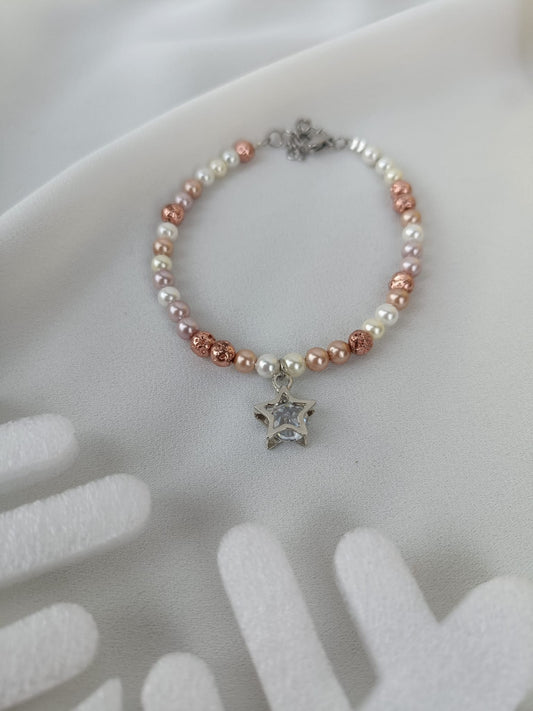 Bracciale perle di fiume chiare/rosate e stella