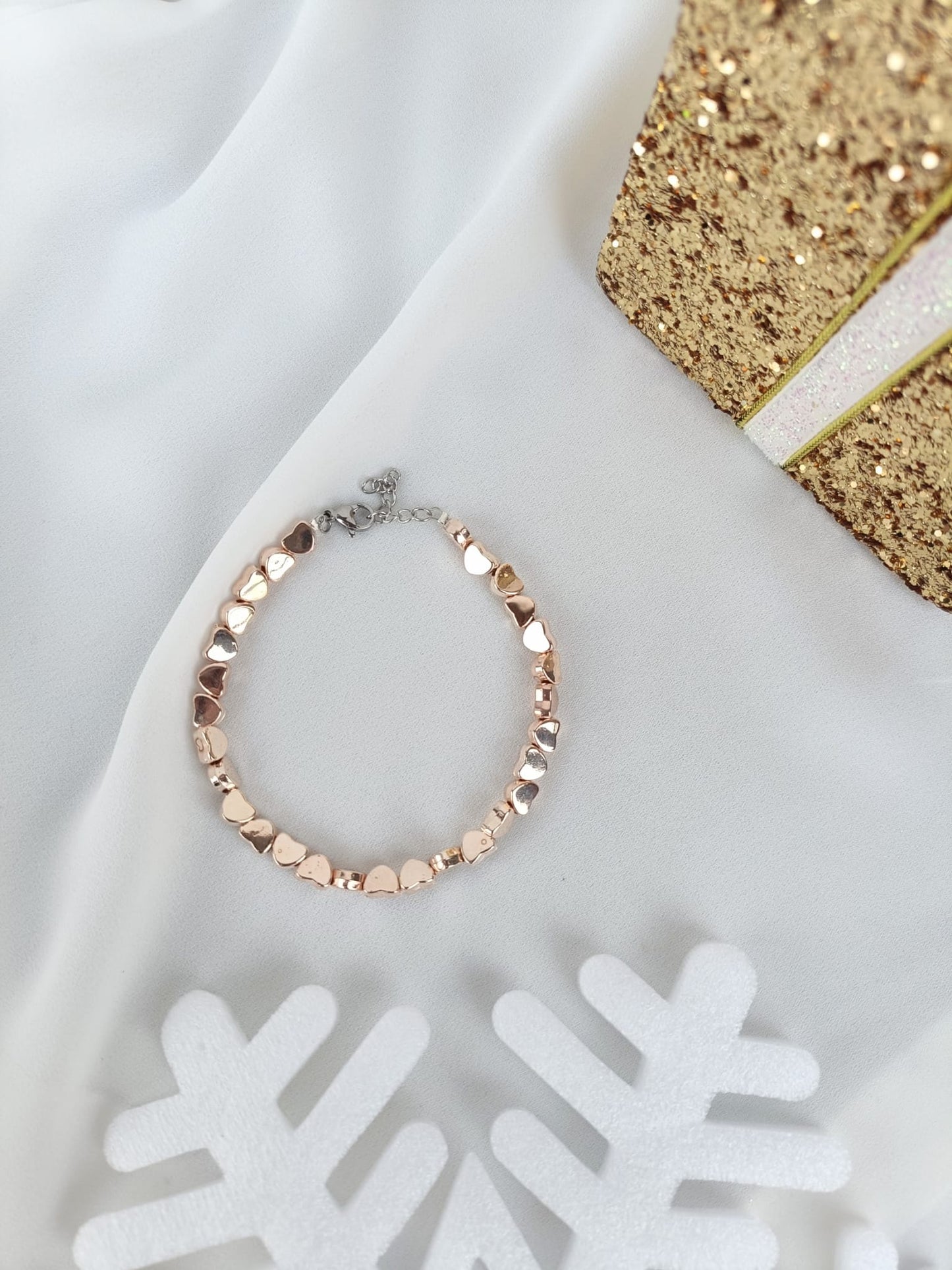 Bracciale cuori ematite argento e oro rosa