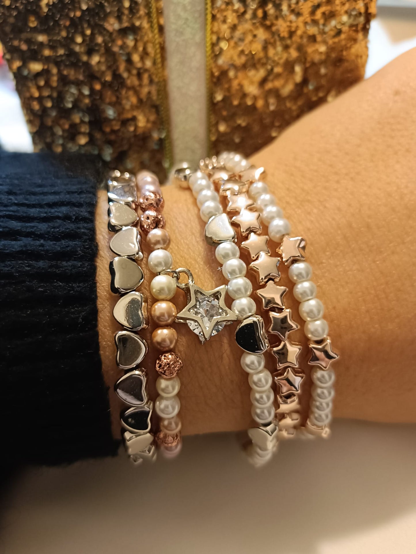 Bracciale perle di fiume chiare/rosate e stella