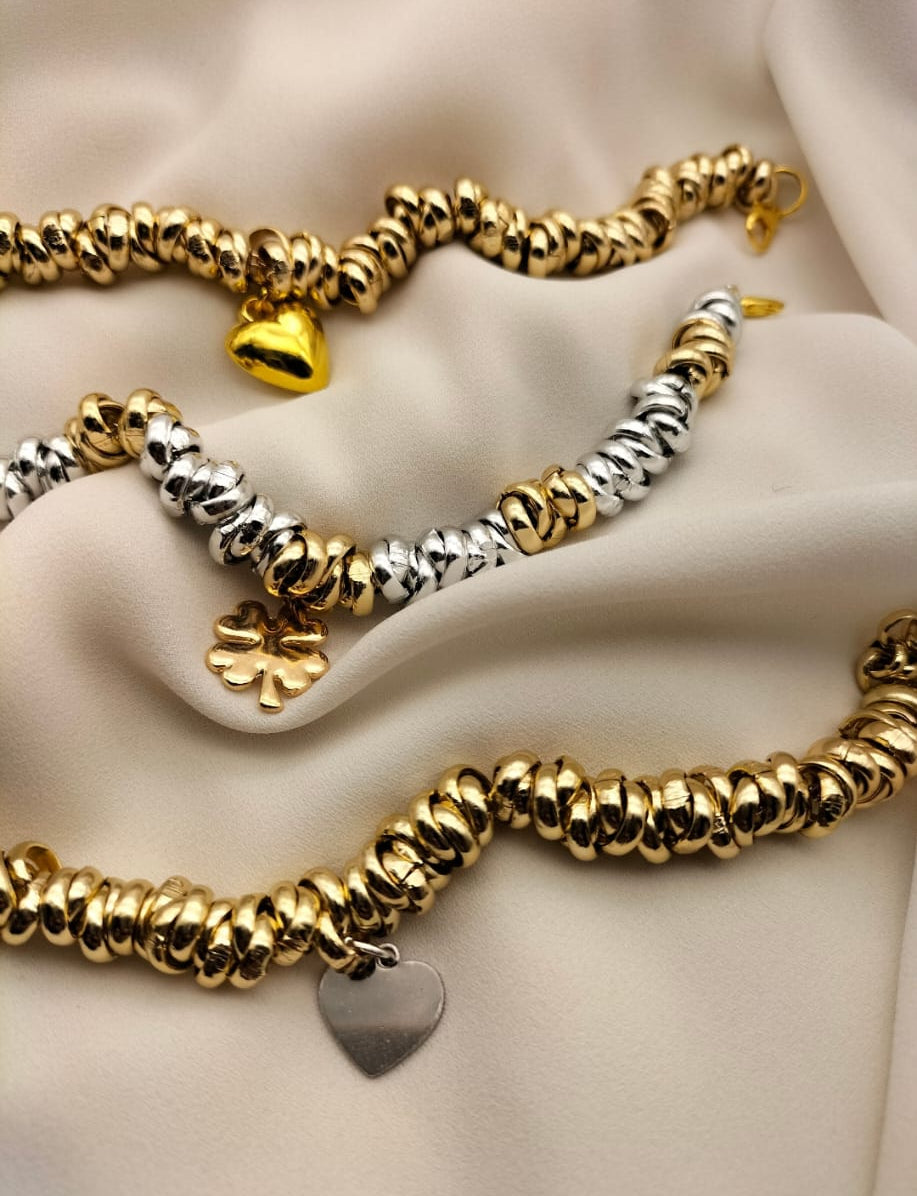 Bracciale nodini argento e oro con quadrifoglio