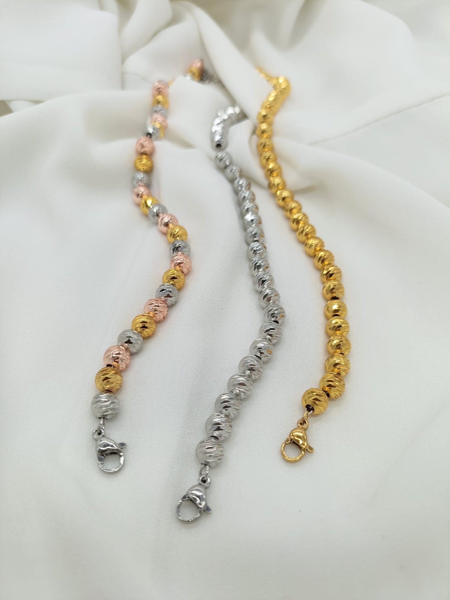 Bracciali sfere sfaccettate