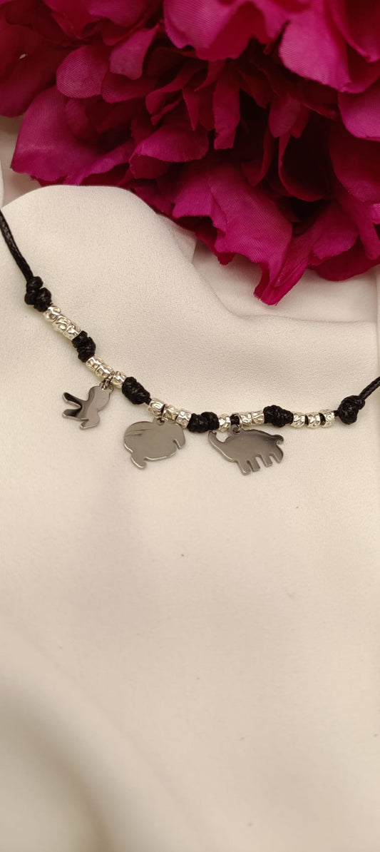 Bracciale cordino, granelli e ciondoli polpo, dodo e elefantino