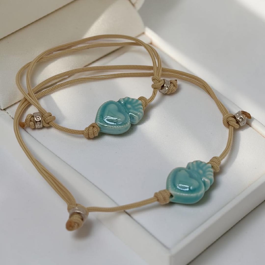 Bracciali di coppi con cuore sacro turchese