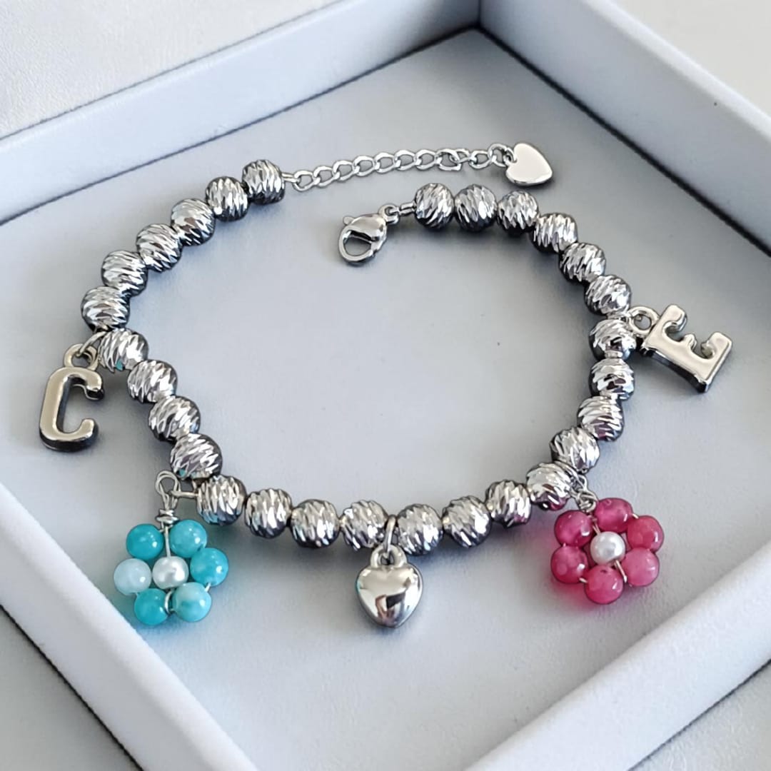 Bracciale sfere sfaccettate con charms