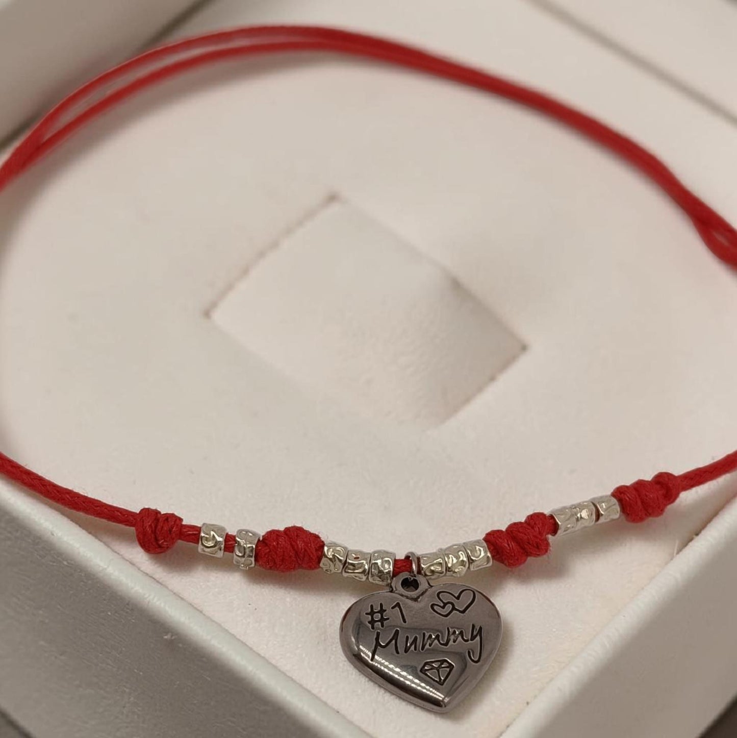 Collana cordino colorato, granelli e charm Mummy