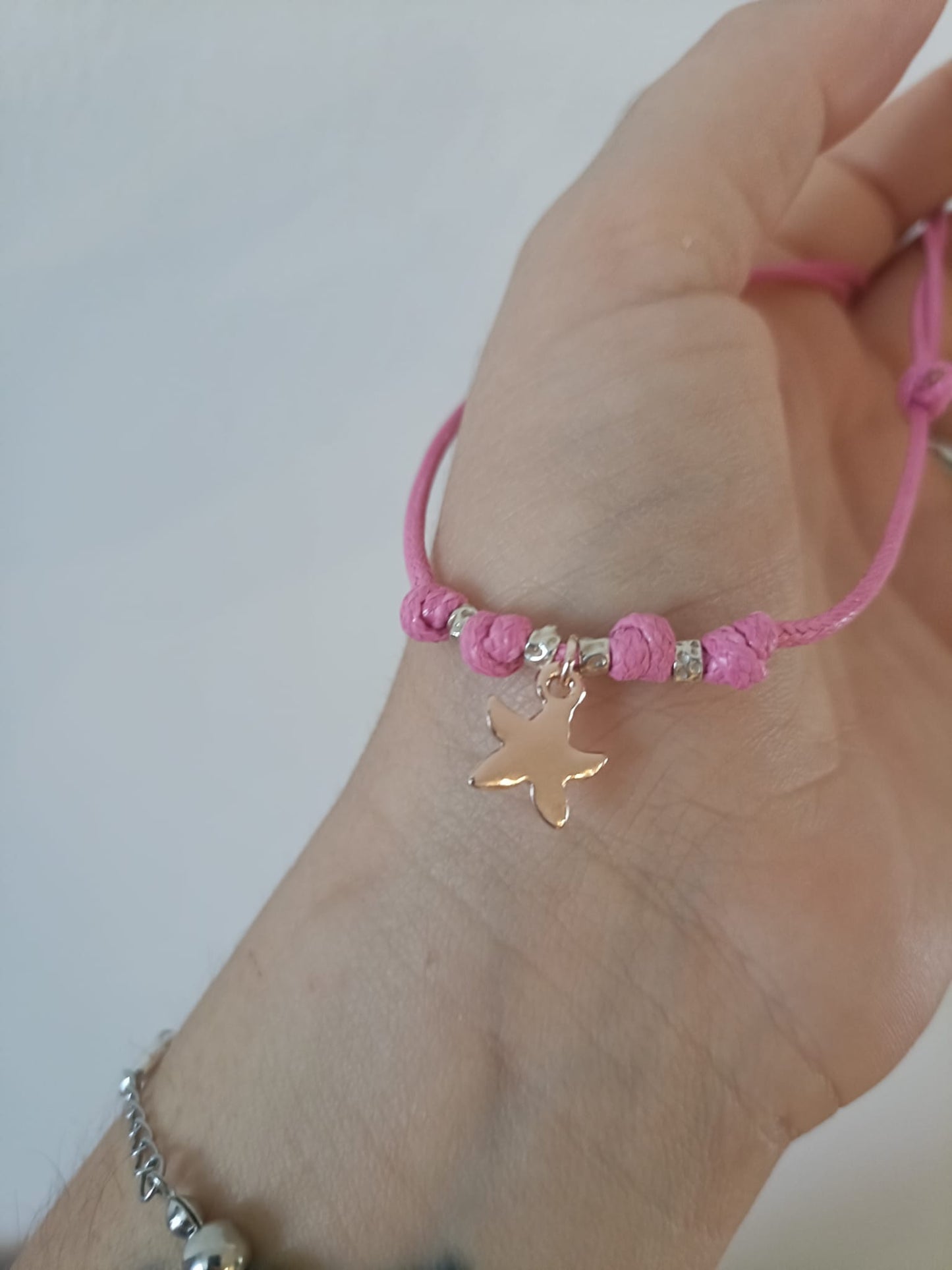 Collana cordino colorato con 4 granelli e stella