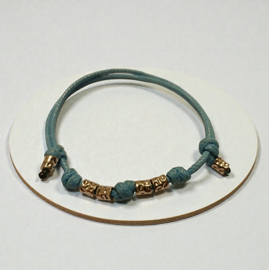 Bracciale cordino con 4 granelli acciaio inossidabile