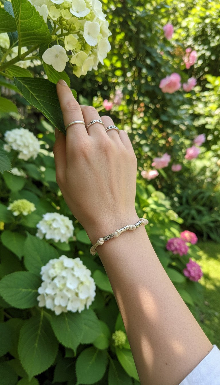 Bracciale cordino 8 granelli acciaio inossidabile