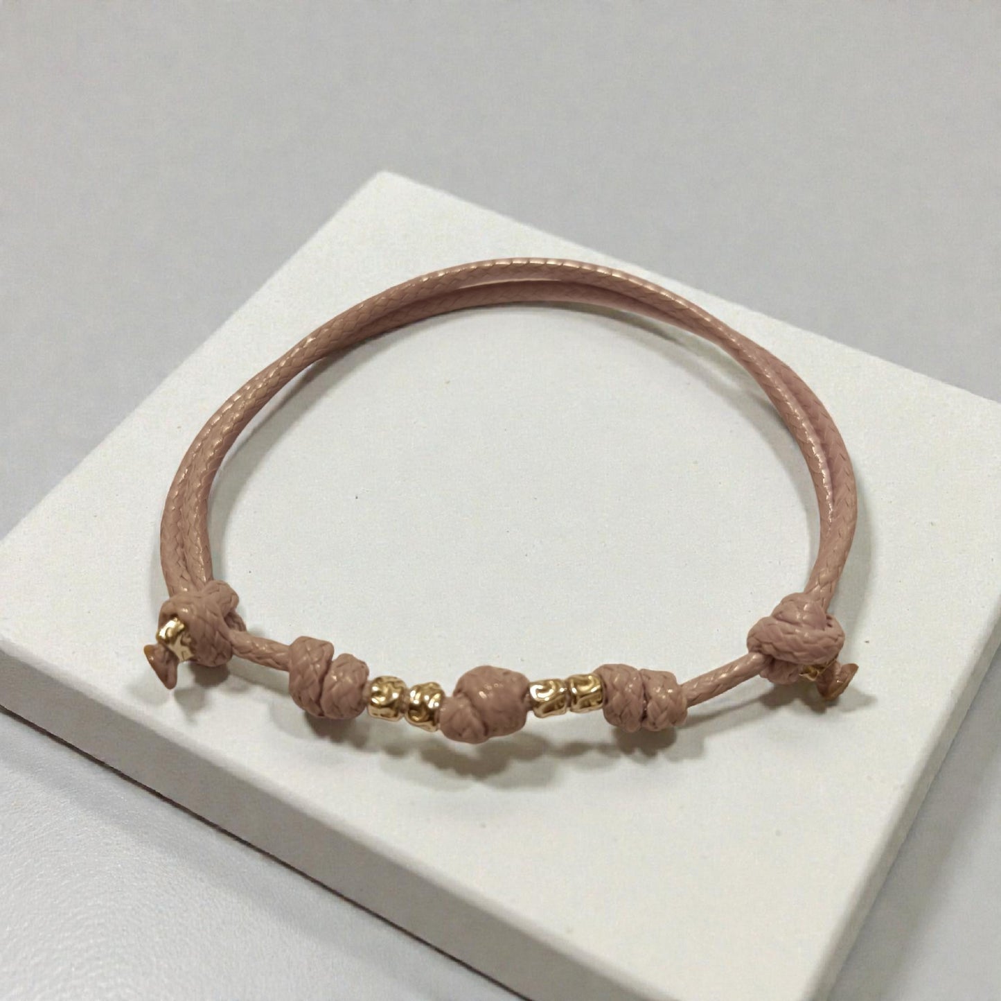 Bracciale cordino, 4 granelli argento 925