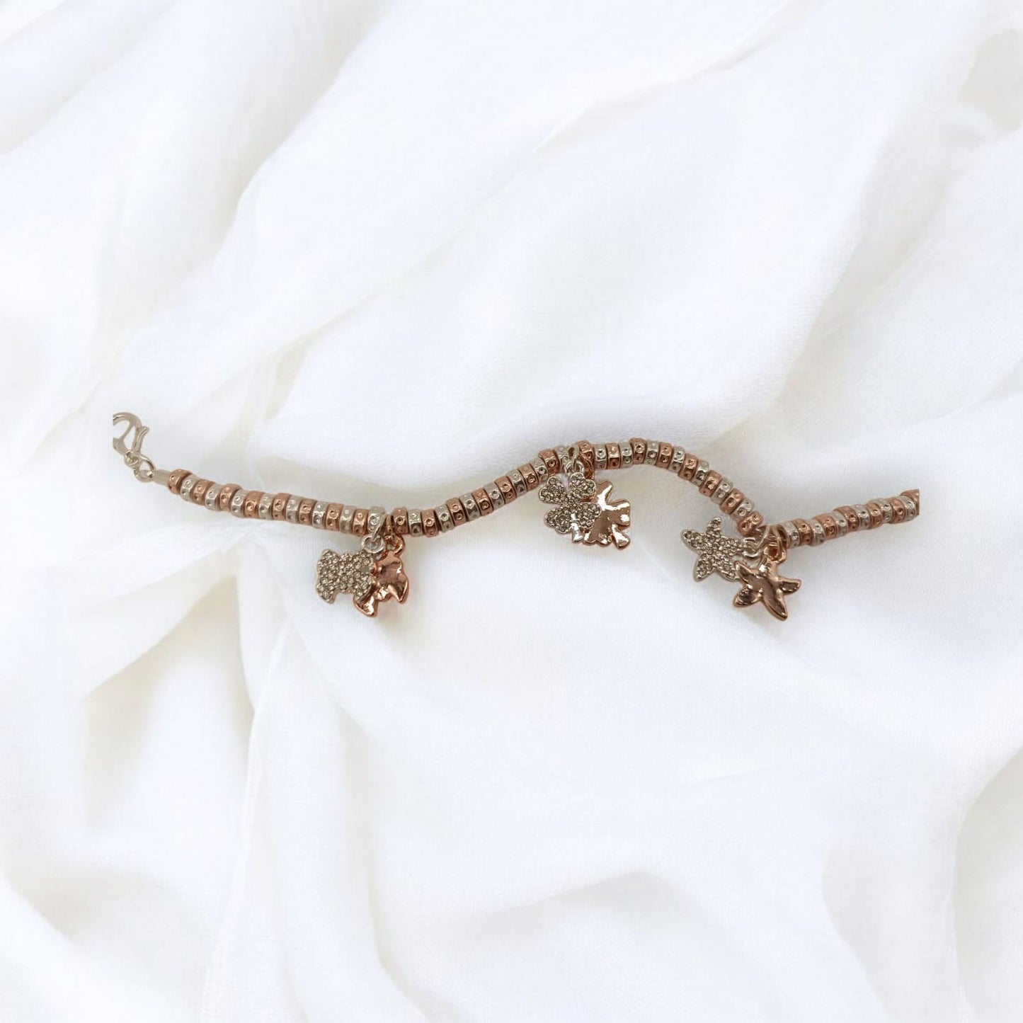 Bracciale granelli martellati argento e oro rosa