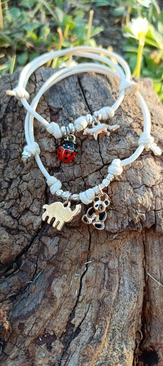 Bracciale cordino granelli e ciondoli elefantino e panda