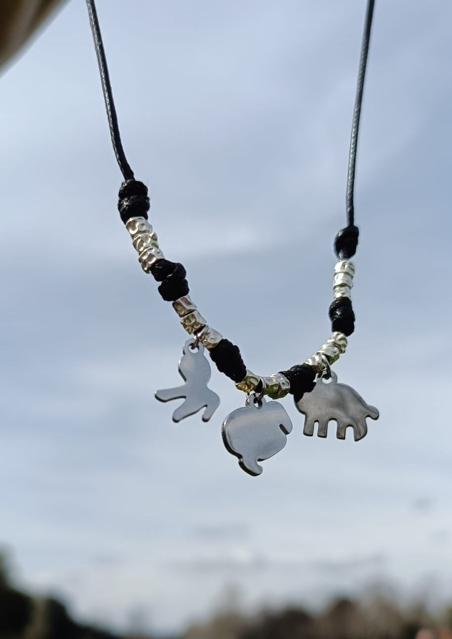 Bracciale cordino, granelli e ciondoli polpo, dodo e elefantino