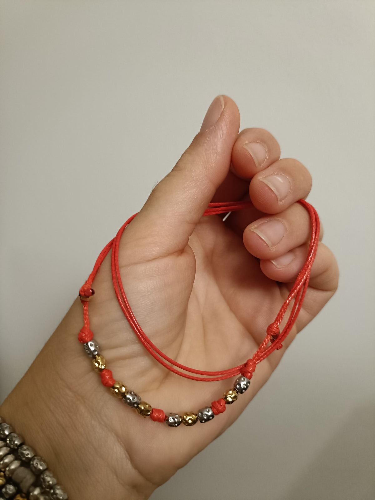 Collana 10 granelli martellati argento oro